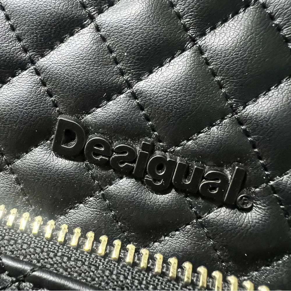 Desigual Claudia Nanaimo Black Quilted Backpack vegan leather lip hang tag